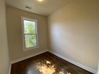 1734 West 35th Street, Unit 2F Chicago, IL 60609 - Photo 5 of 7 an empty room with a window