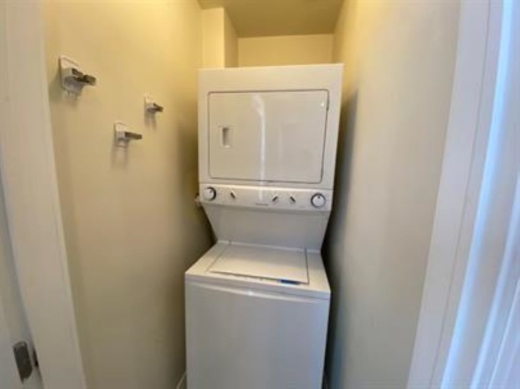 1734 West 35th Street, Unit 2F Chicago, IL 60609 - Photo 7 of 7 a utility room with dryer and washer