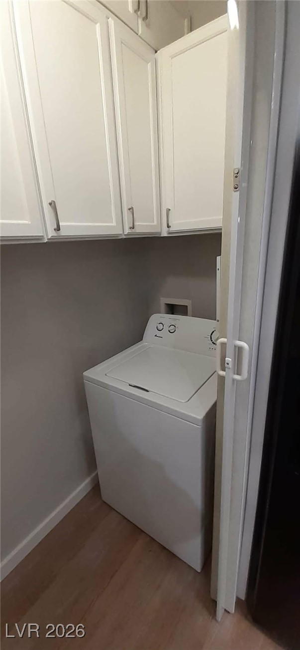8555 West Russell Road, Unit 2018 Las Vegas, NV 89113 - Photo 19 of 31 Washroom with cabinet space, washer / dryer, and light wood-type flooring