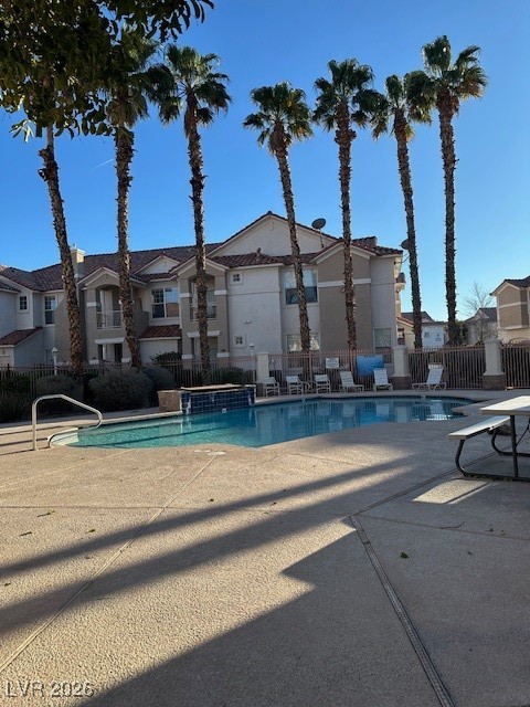 8555 West Russell Road, Unit 2018 Las Vegas, NV 89113 - Photo 26 of 31 Community pool with a patio area