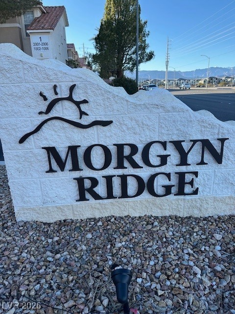 8555 West Russell Road, Unit 2018 Las Vegas, NV 89113 - Photo 31 of 31 Community sign with a mountain view