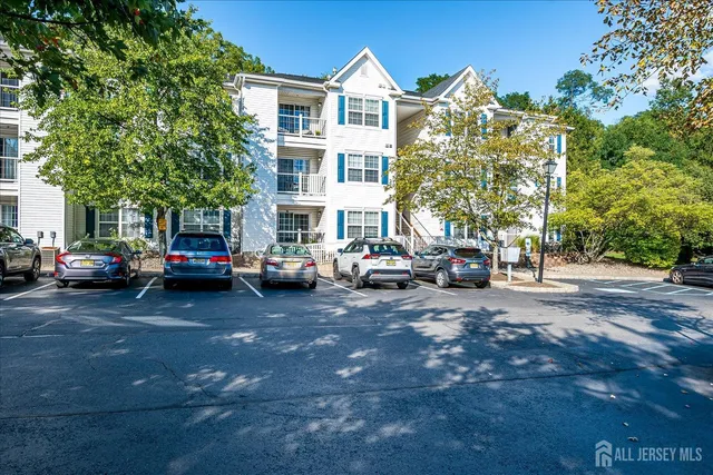 a building with trees in front of it