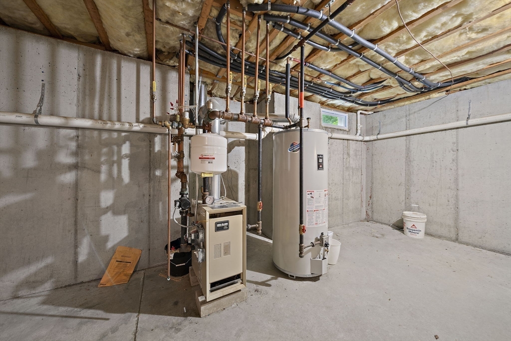 14 Sugar Maple Circle, Unit 14 Hanover, MA 02339 - Photo 29 of 38 a view of water heater room