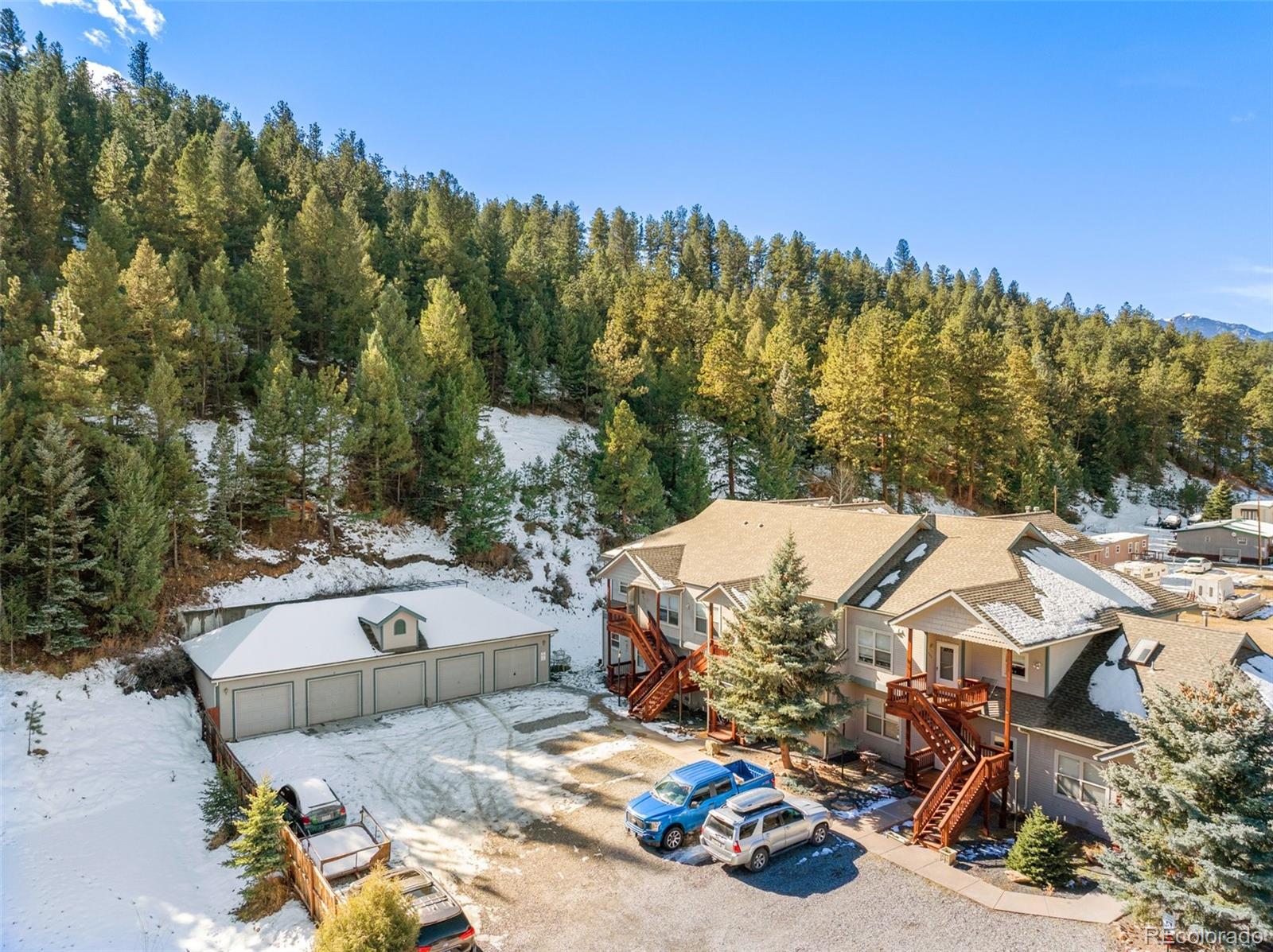 5720 County Road 64, Unit 101A Bailey, CO 80421 - Photo 29 of 46 a view of a couches and table in the terrace