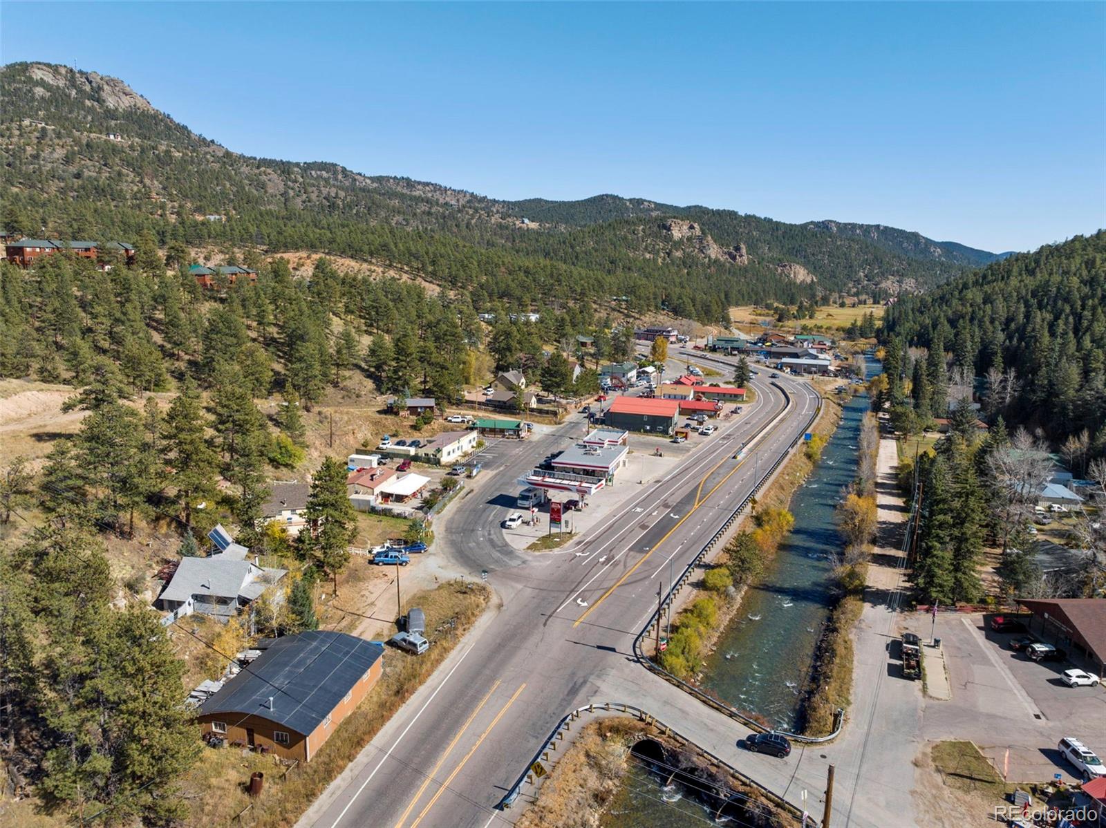 5720 County Road 64, Unit 101A Bailey, CO 80421 - Photo 34 of 46 aerial view of city and mountain