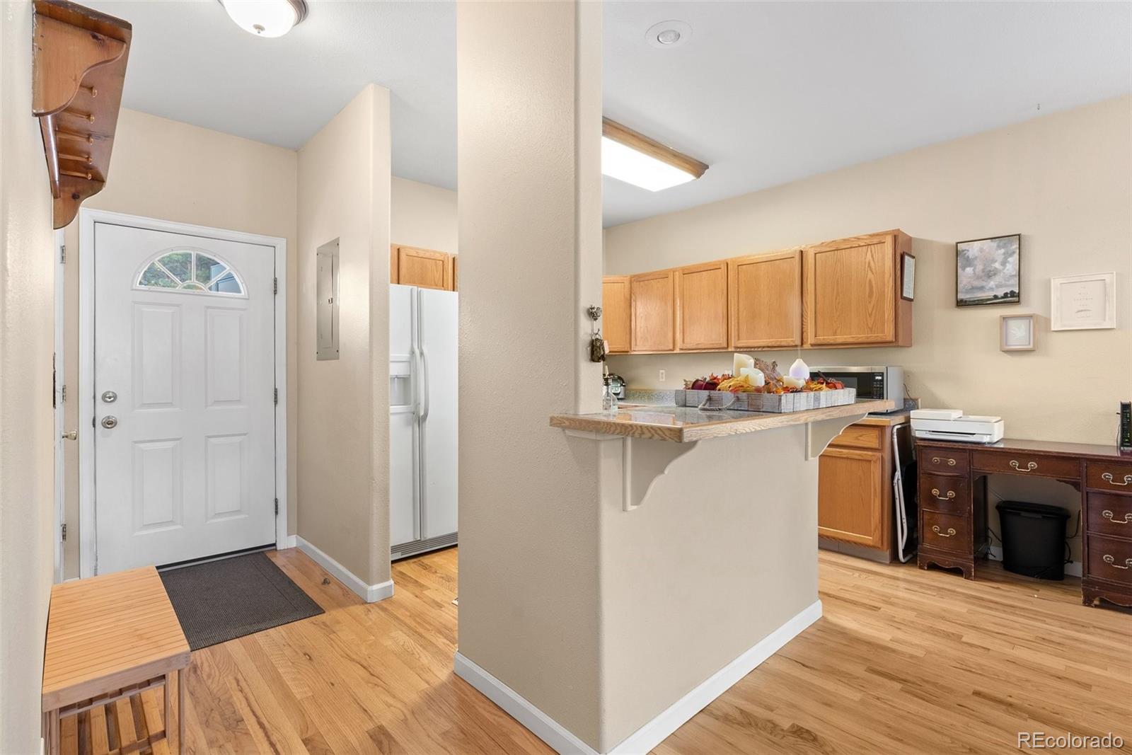 5720 County Road 64, Unit 101A Bailey, CO 80421 - Photo 4 of 46 a kitchen with stainless steel appliances granite countertop a refrigerator and a stove top oven