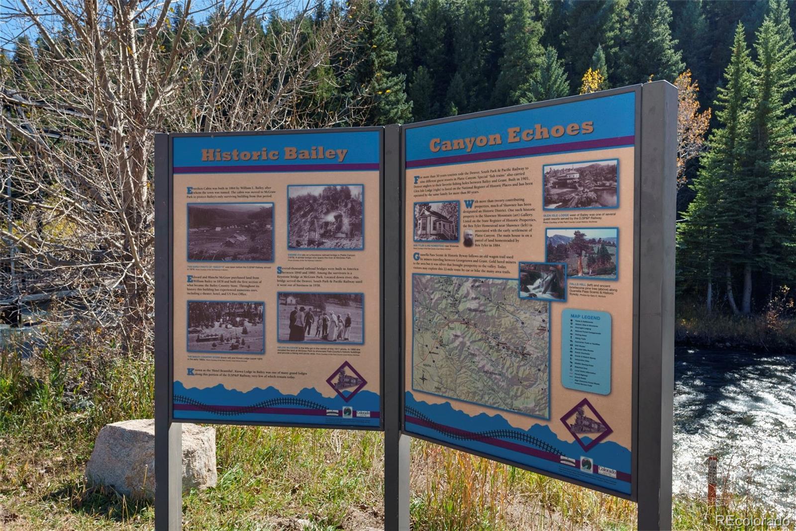 5720 County Road 64, Unit 101A Bailey, CO 80421 - Photo 41 of 46 front view of a building with a tree