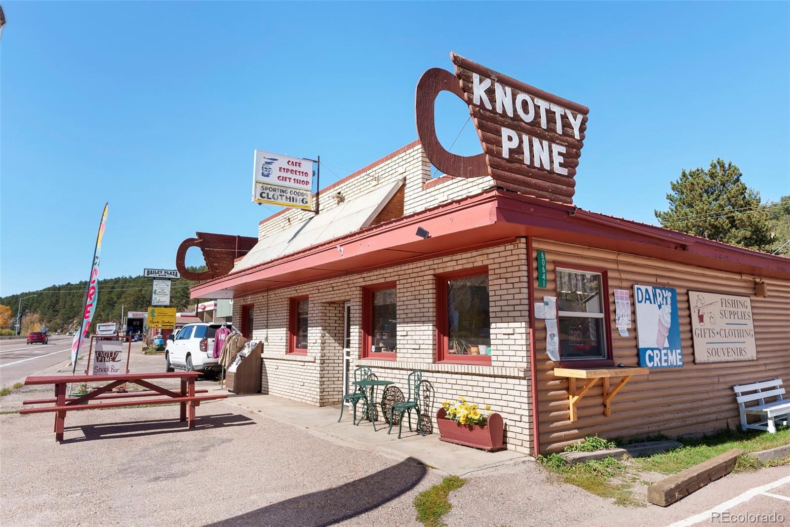5720 County Road 64, Unit 101A Bailey, CO 80421 - Photo 43 of 46 a view of a chairs and table in the patio