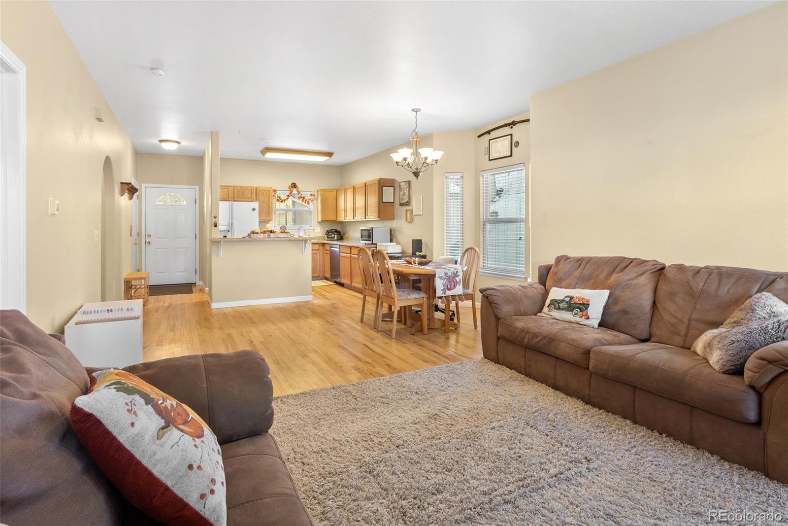 5720 County Road 64, Unit 101A Bailey, CO 80421 - Photo 7 of 46 a living room with furniture and a large window