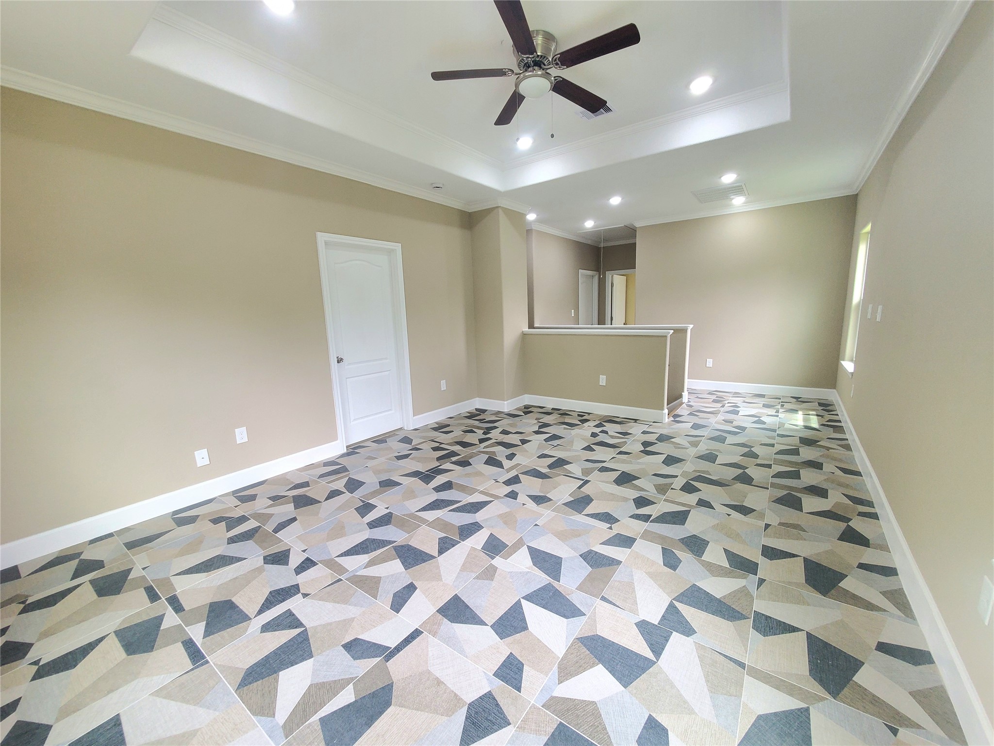 1306 North 9th Street Conroe, TX 77301 - Photo 15 of 47 a view of a livingroom with a chandelier fan and wooden floor