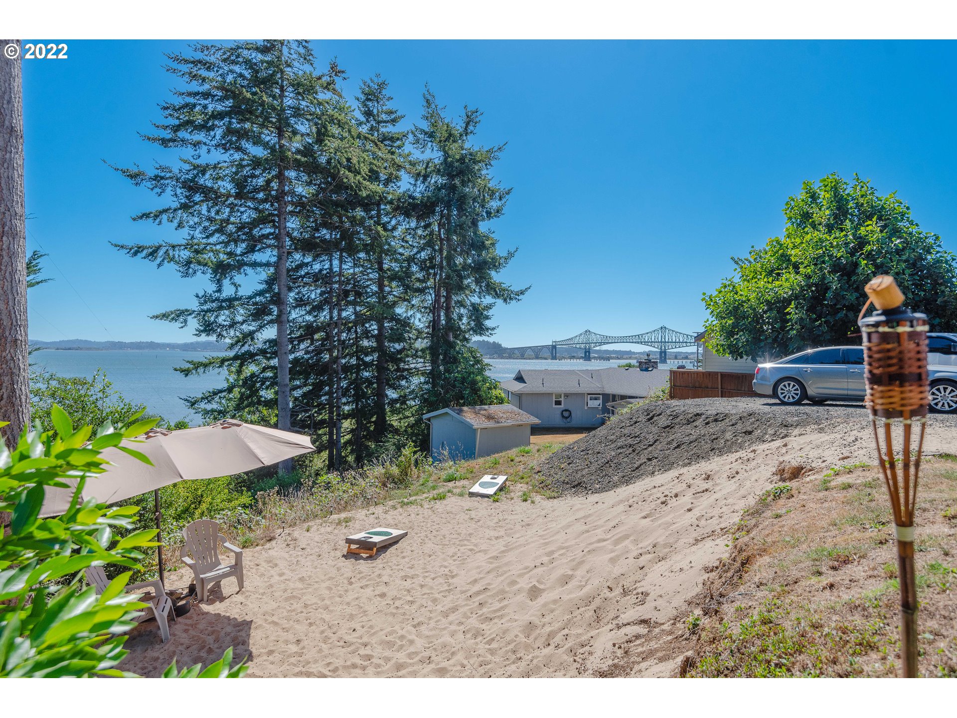 67506 East Bay Road North Bend, OR 97459 - Photo 24 of 31 a view of a backyard of the house