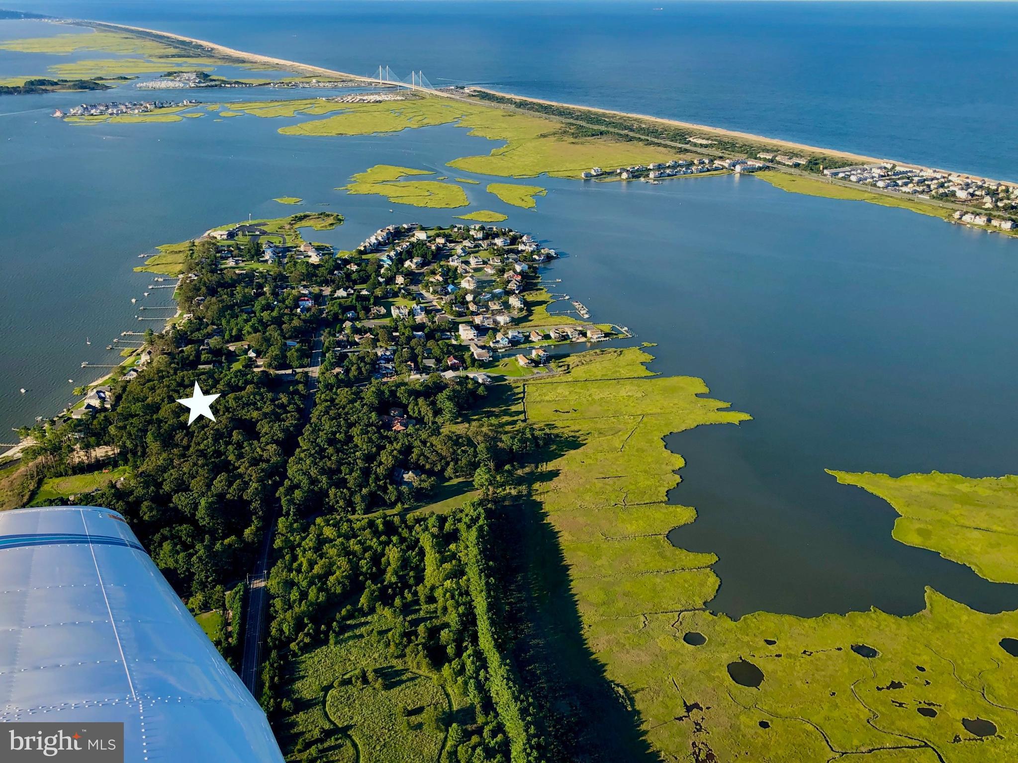 1st Street Ocean View, DE 19970 - Photo 3 of 10 a view of balcony with wooden floor