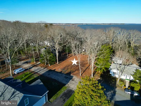 a view of a lake with a yard