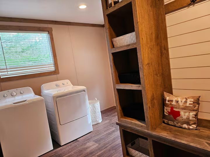 105 Saddle Surrey Road Coldspring, TX 77331 - Photo 34 of 48 a room with storage and utility