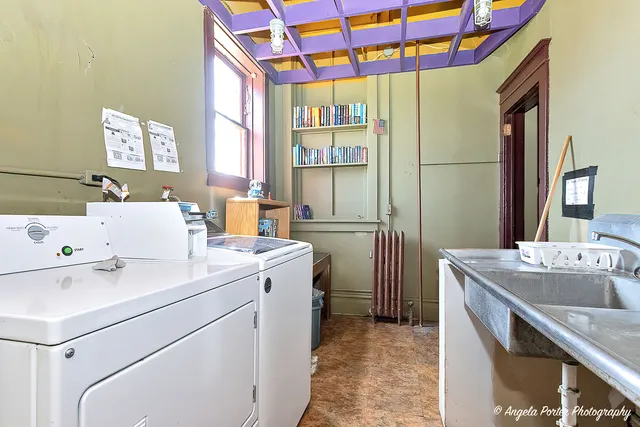 a utility room with dryer and washer