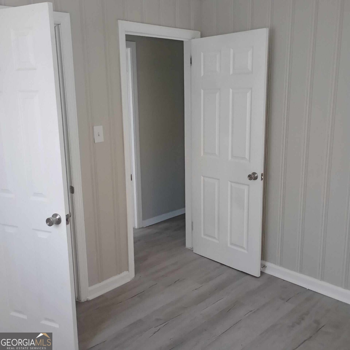 193 Frazier Drive Southeast Milledgeville, GA 31061 - Photo 34 of 38 an empty room with wooden floor