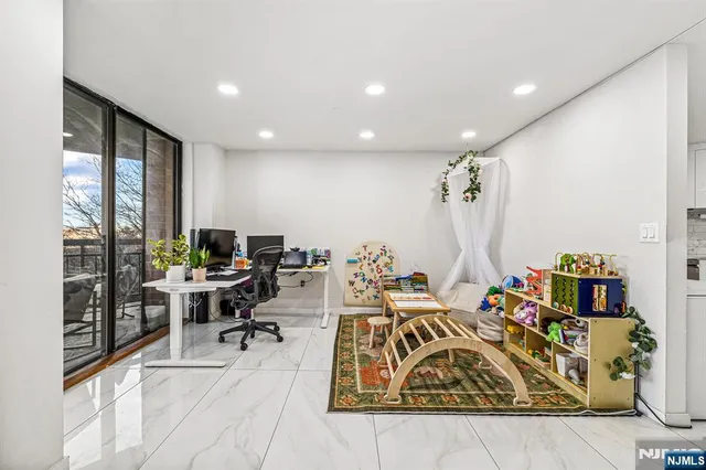 a view of a workspace with furniture