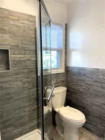 a bathroom with a toilet