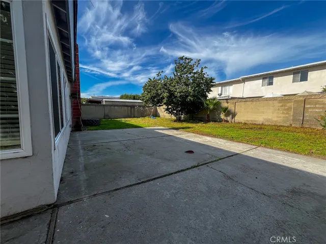 a view of an empty room with a yard