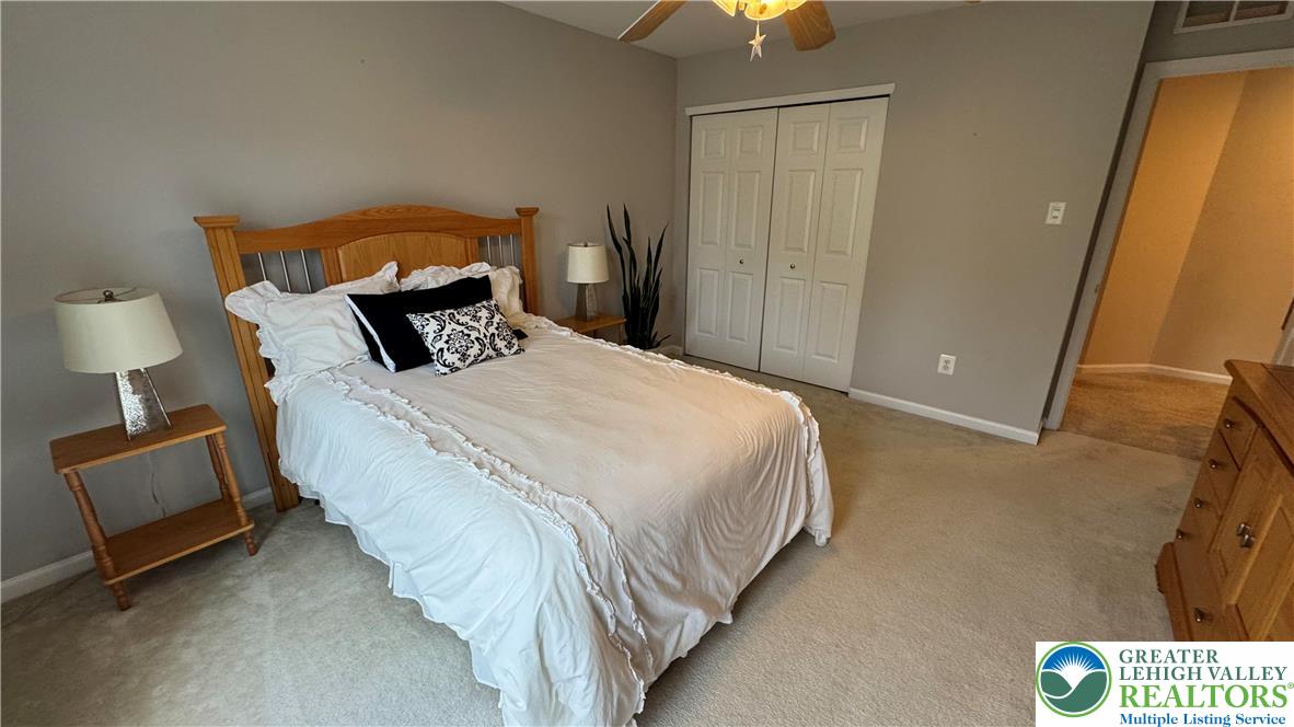 135 Clover Hollow Road Easton, PA 18045 - Photo 25 of 66 a bed room with a bed and a lamp