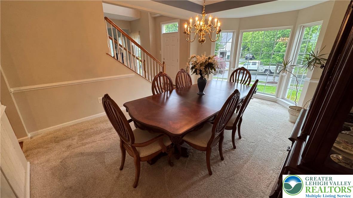 135 Clover Hollow Road Easton, PA 18045 - Photo 39 of 66 a view of a dining room with furniture window and outside view