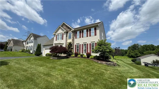 a house view with a garden space