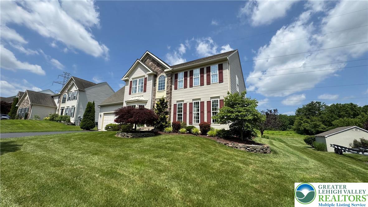 135 Clover Hollow Road Easton, PA 18045 - Photo 4 of 66 a house view with a garden space