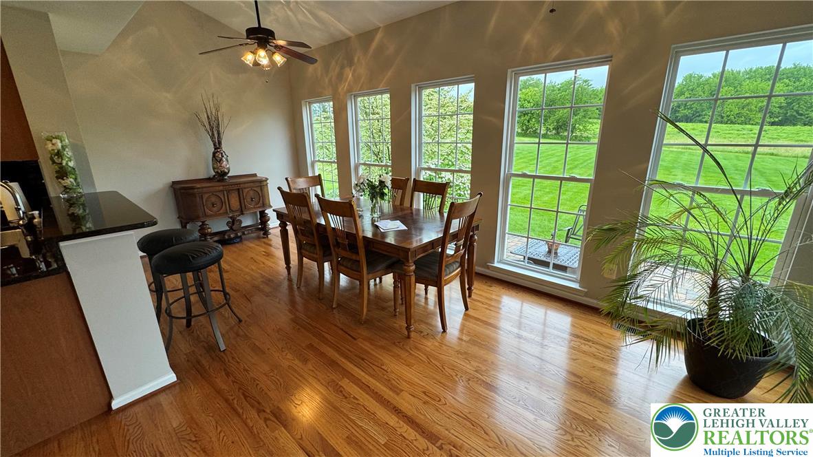 135 Clover Hollow Road Easton, PA 18045 - Photo 45 of 66 a view of a dining room with furniture window and wooden floor