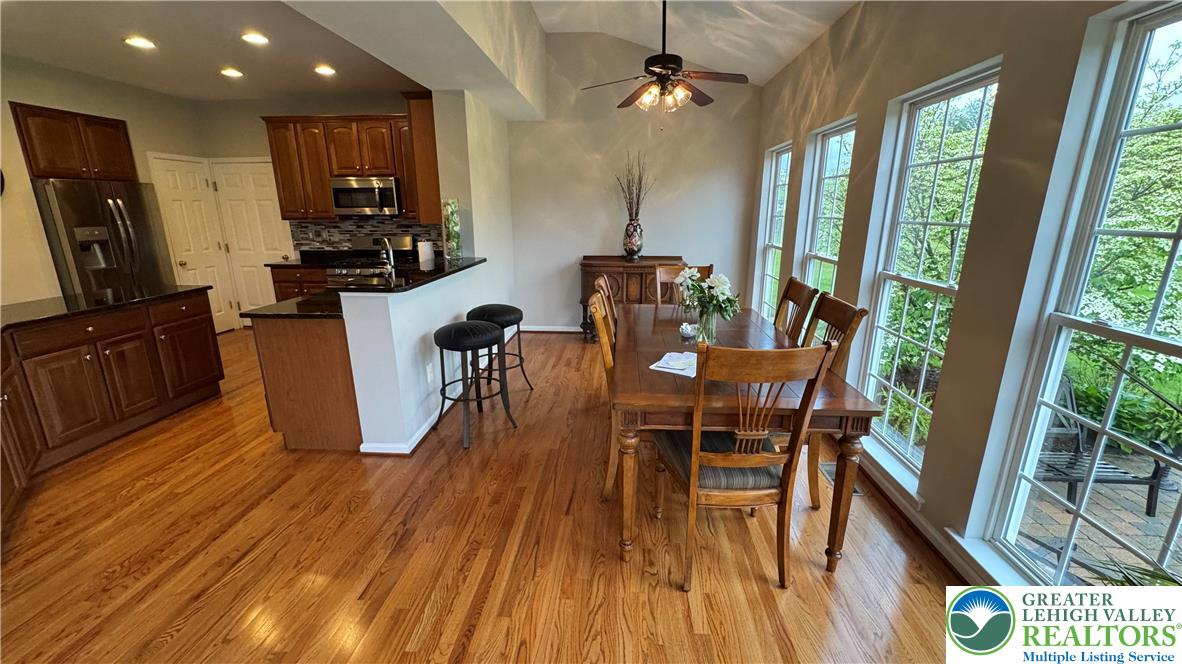 135 Clover Hollow Road Easton, PA 18045 - Photo 46 of 66 a view of a dining room with furniture window and wooden floor