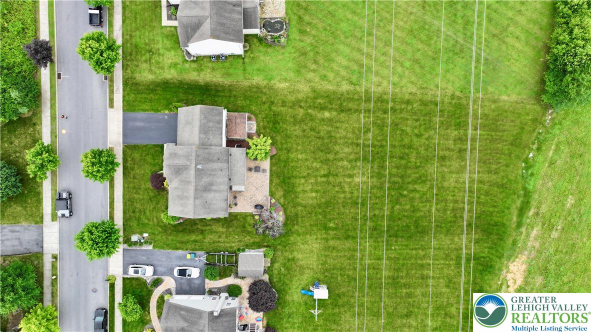 135 Clover Hollow Road Easton, PA 18045 - Photo 66 of 66 an aerial view of a house with a yard basket ball court and outdoor seating