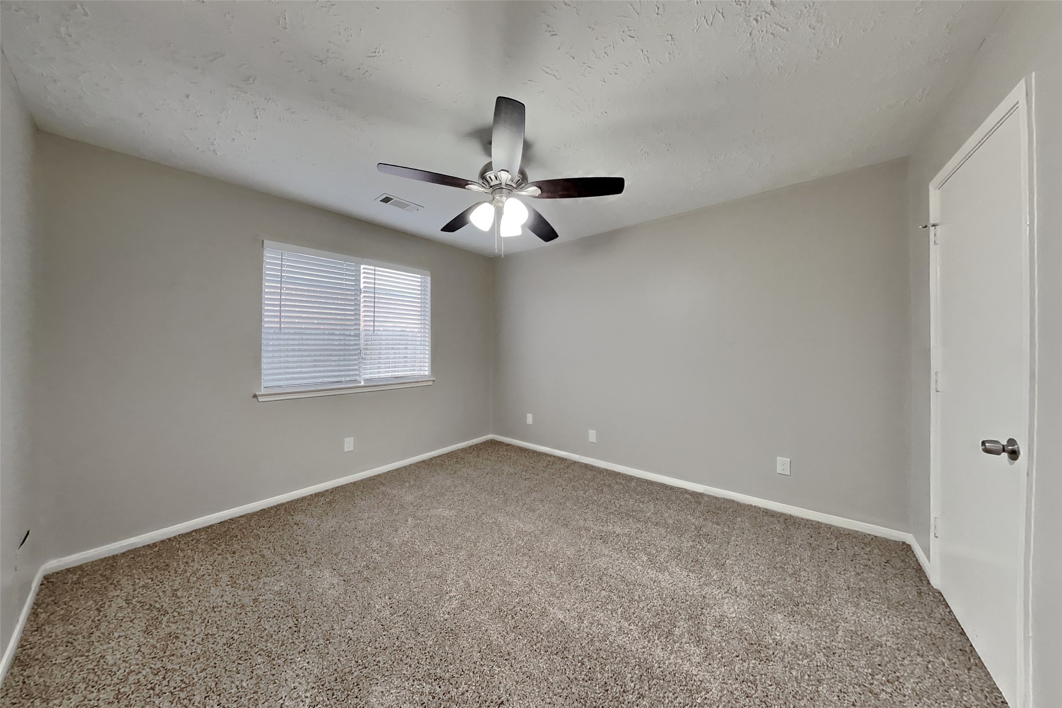 3413 Jan Court Katy, TX 77493 - Photo 13 of 18 a view of an empty room with a window