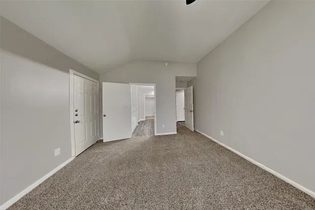 a view of an empty room and window