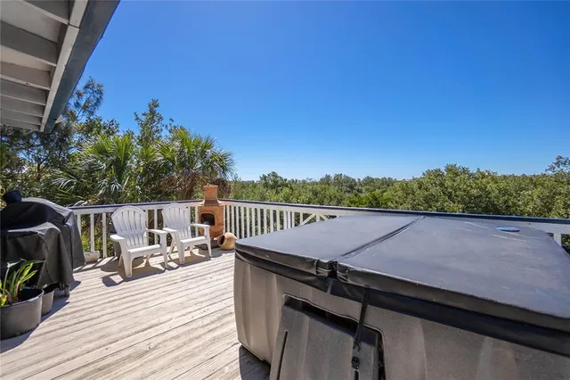 a kitchen with stainless steel appliances granite countertop a sink a stove top oven a counter space and cabinets