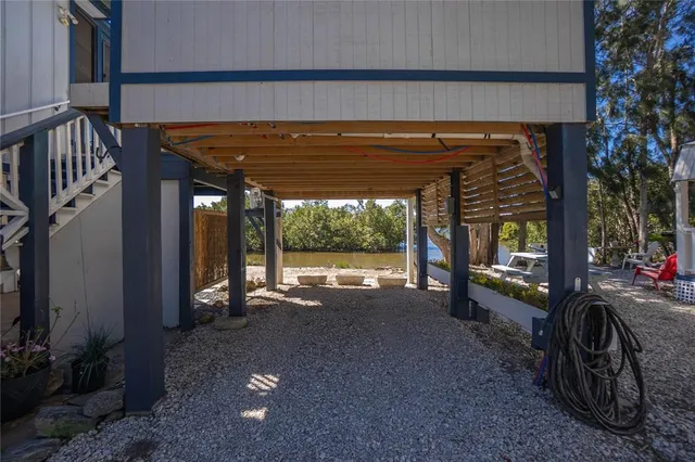 a view of a living room and a balcony