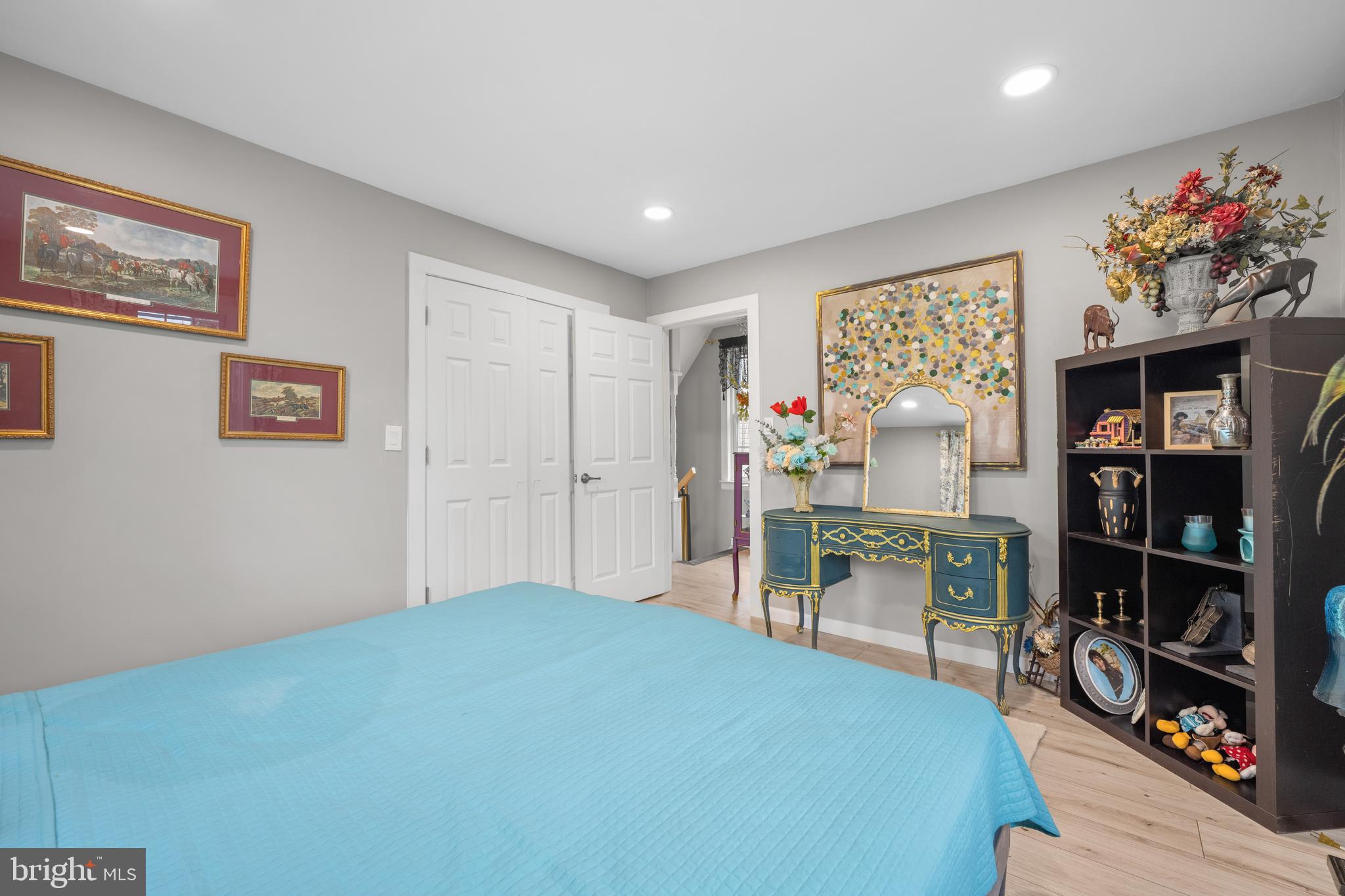 121 Cleveland Avenue Riverside, NJ 08075 - Photo 19 of 35 a bedroom with a bed and a bookshelf