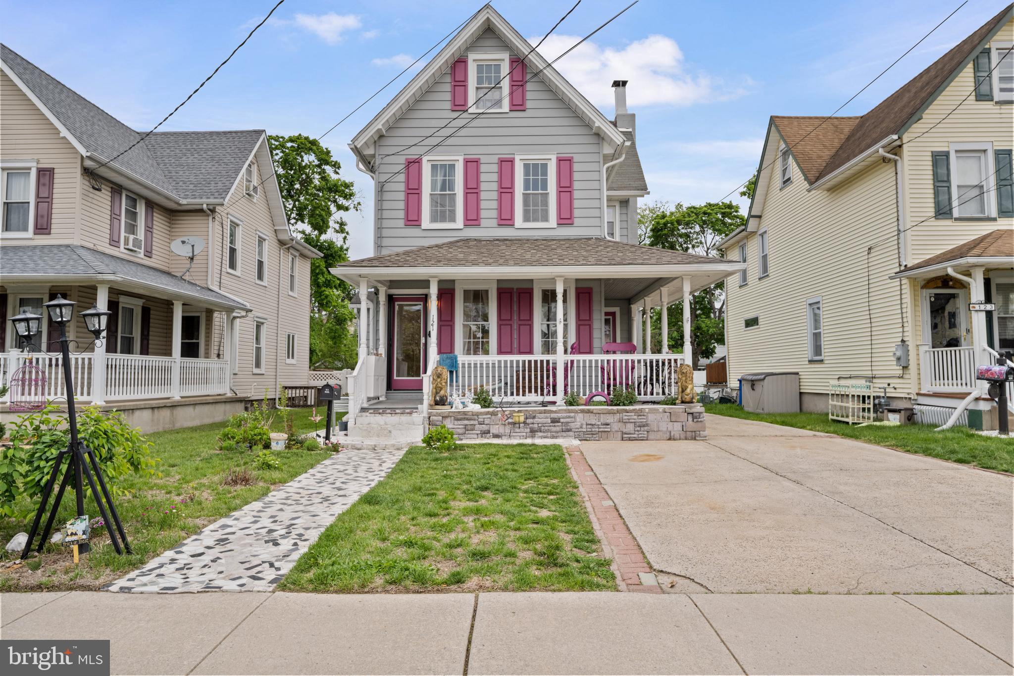 121 Cleveland Avenue Riverside, NJ 08075 - Photo 2 of 35 front view of a brick house with a yard