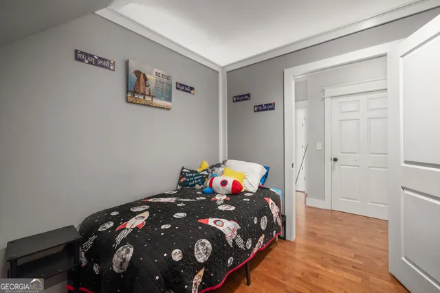 a bathroom with a bathtub and window