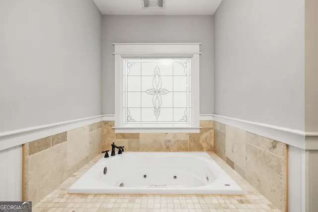 a backyard of a house with seating space