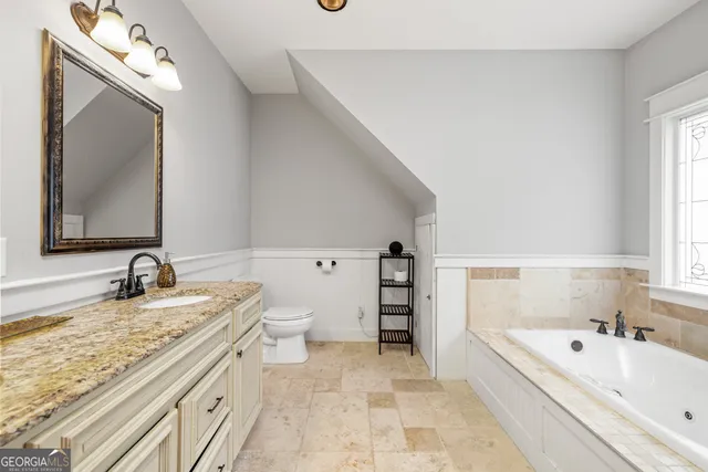 a utility room with a window washer and dryer