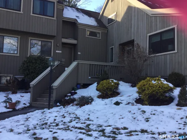 a view of a backyard with a patio