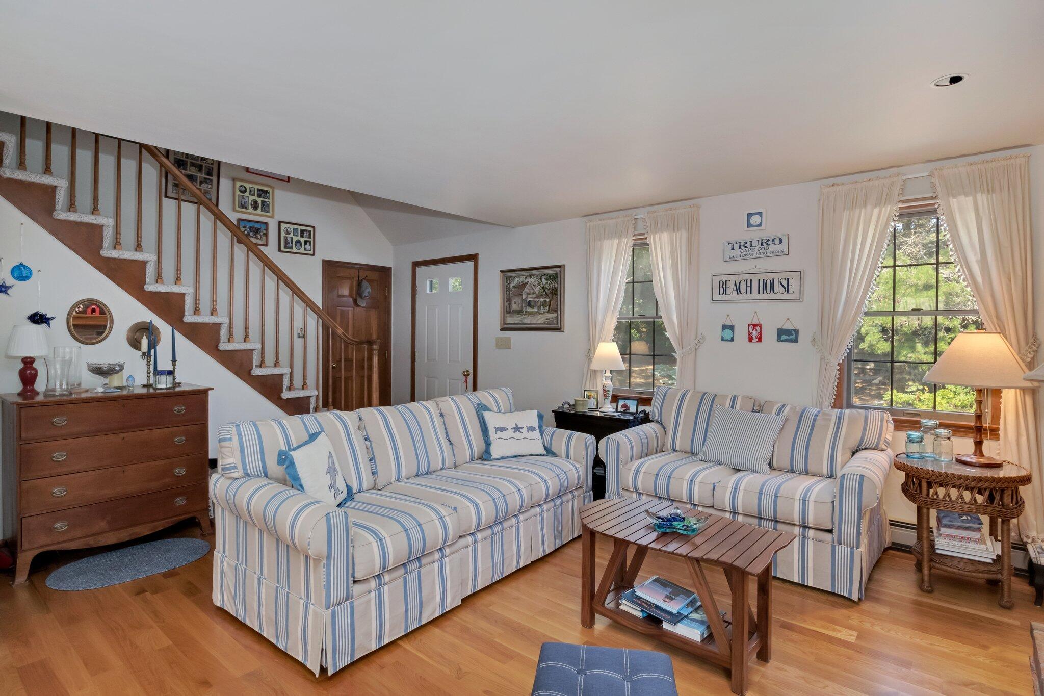106 Castle Road Truro, MA 02666 - Photo 12 of 47 a living room with furniture and a window