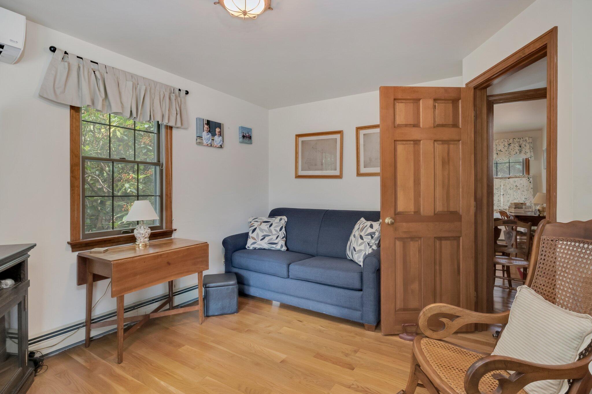 106 Castle Road Truro, MA 02666 - Photo 24 of 47 a living room with furniture and a window