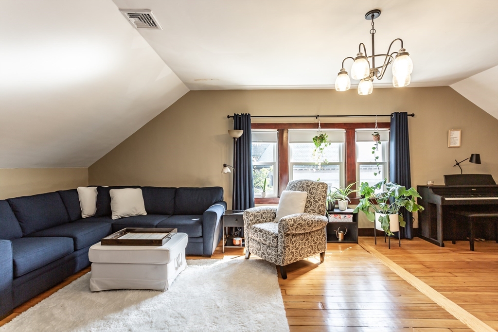 256 Maple Street Fall River, MA 02720 - Photo 29 of 41 a living room with furniture and a large window