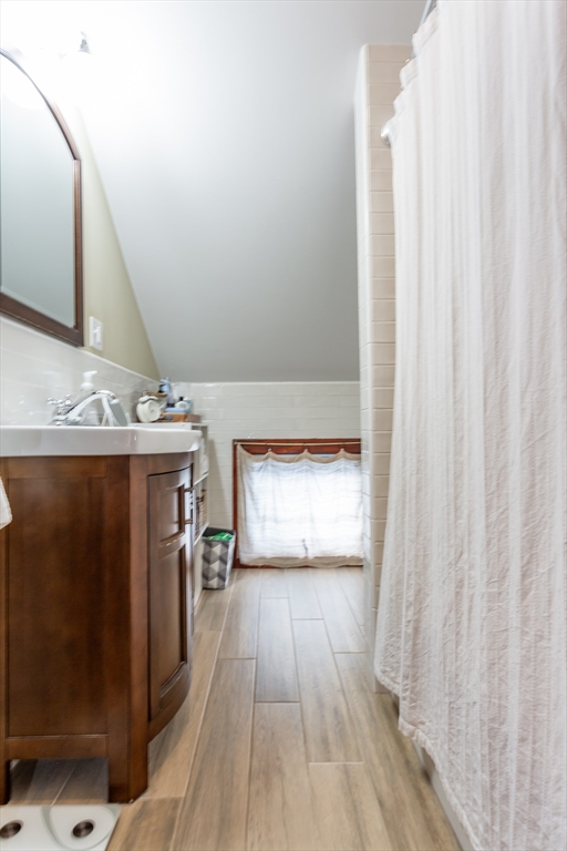 256 Maple Street Fall River, MA 02720 - Photo 33 of 41 a view of a hallway with wooden floor and staircase