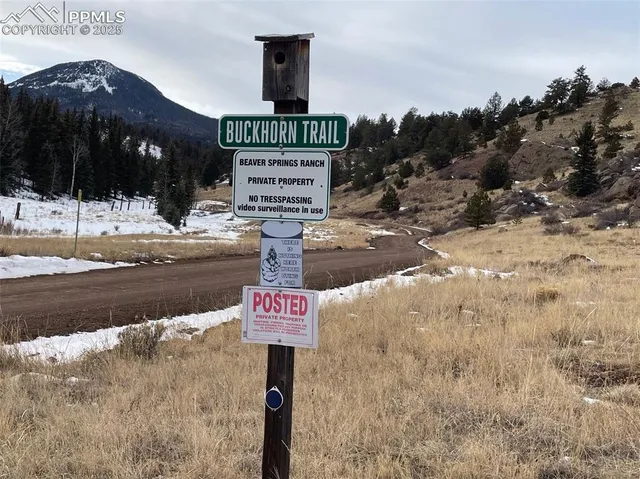 a street sign on a pole on a street
