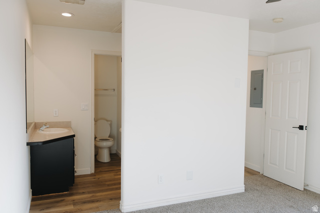 215 South 1050th West, Unit 10 Provo, UT 84601 - Photo 22 of 38 Bathroom with vanity, electric panel, and recessed lighting