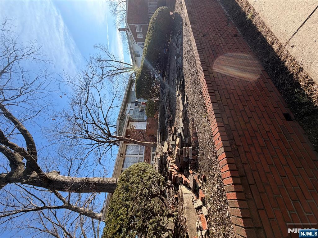 1032 Glen Road Fort Lee, NJ 07024 - Photo 3 of 16 a view of a house with a yard