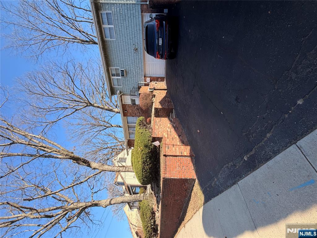 1032 Glen Road Fort Lee, NJ 07024 - Photo 4 of 16 a view of a car parked on the side of the road