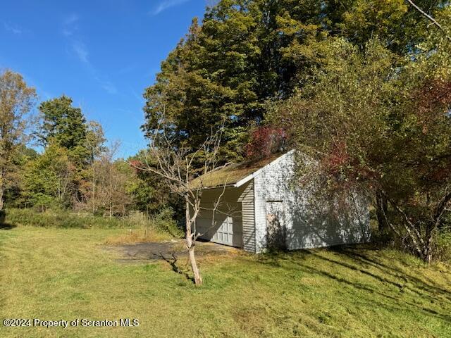 1736 Falls Road Clarks Summit, PA 18411 - Photo 13 of 26 a view of a yard with swimming pool