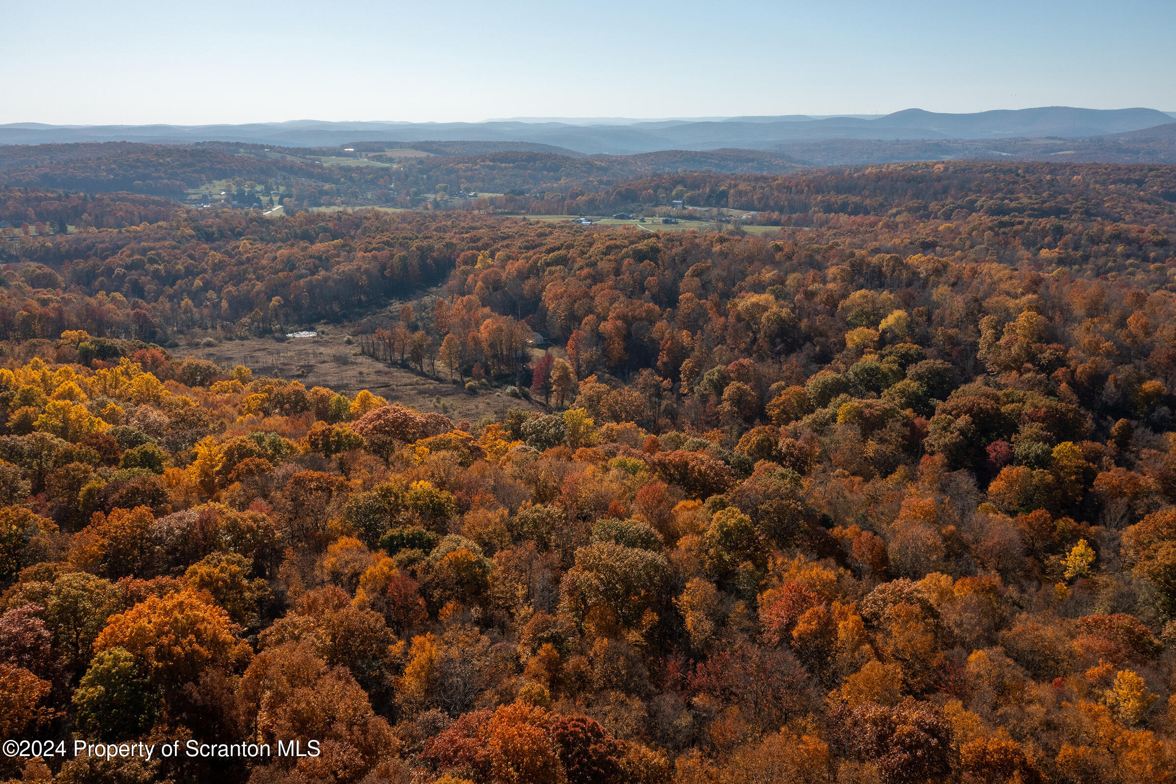 1736 Falls Road Clarks Summit, PA 18411 - Photo 3 of 26 an aerial view of town and residential houses with outdoor space and trees